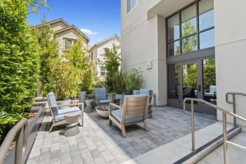 Outdoor patio lounge at aventine apartments in hercules, ca 94547